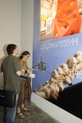 People in front of Take2030 Poster