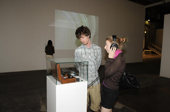 People in front of Luke Jerram piece