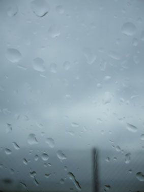 Looking at the Firth Of Forth Through a Fence Through a Rainy Window